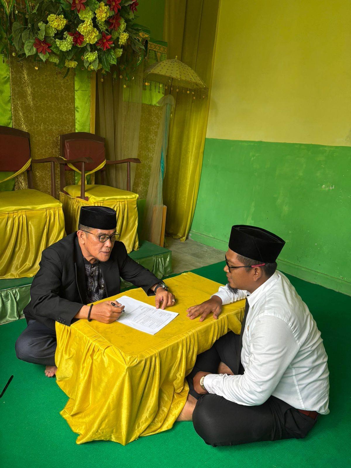Plt. Kepala KUA Bandar Khalifah Gelar PKBT Kepenghuluan