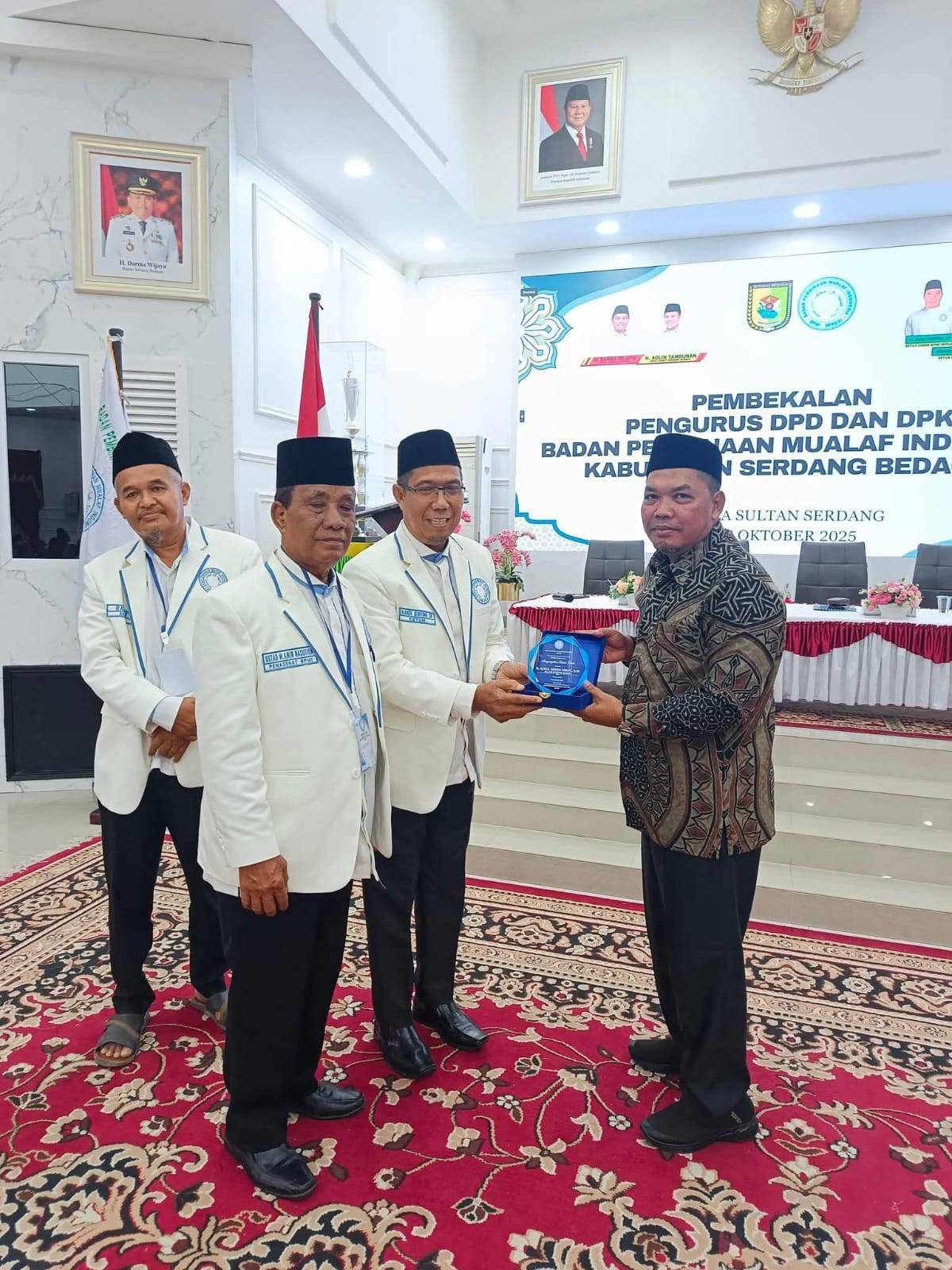 Ka. KUA Pantai Cermin Wakili Kemenag Sergai Pembekalan Pengurus BPMI dan Santunan kepada Anak Yatim