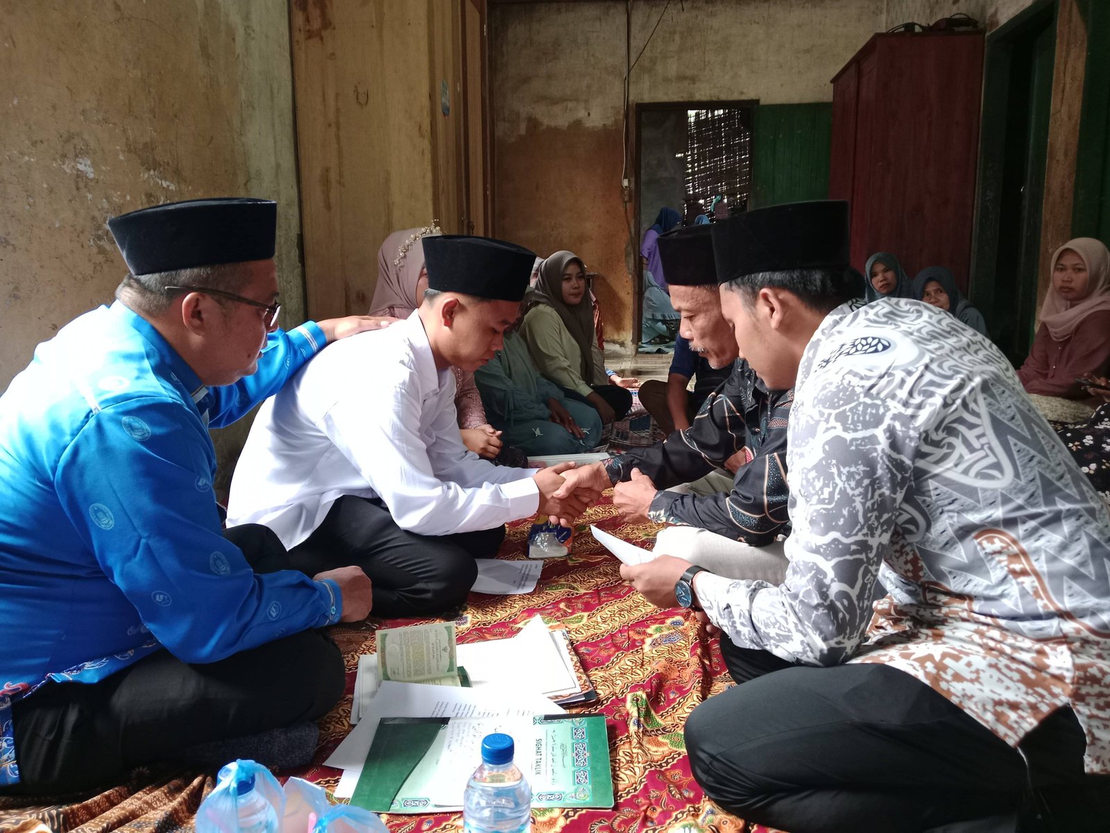 Ka. KUA Bosar Maligas Laksanakan Pencatatan Nikah di Nagori Nanggar Bayu