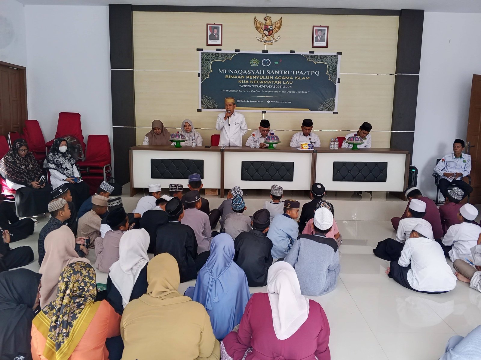Kepala KUA Lau Tekankan Nilai Perjuangan dan Misi Al-Qur’an pada Munaqasyah Santri TPA/TPQ