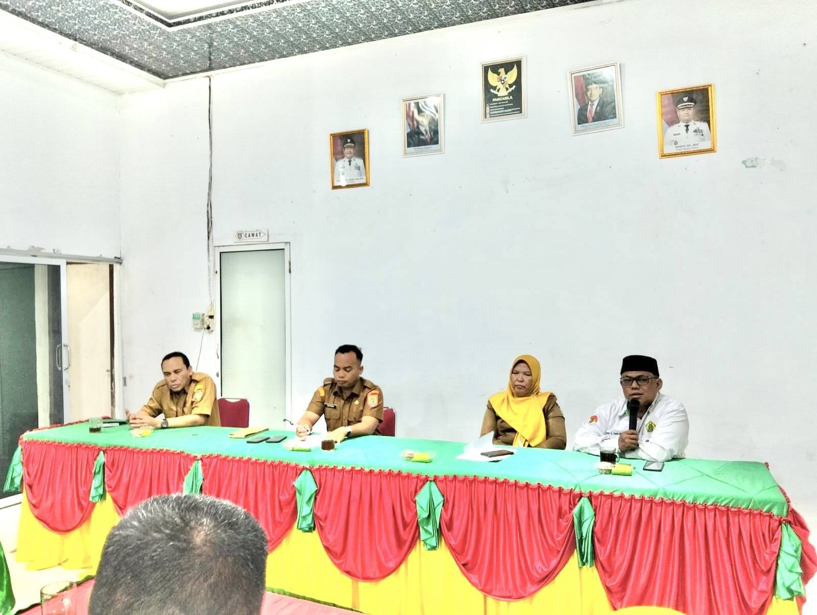 Kepala KUA Sei Kepayang Ajak Kepala Desa Pahami Aturan Nikah Siri dalam KUHAP No. 1 Tahun 2023 di Rakorcam Sei Kepayang