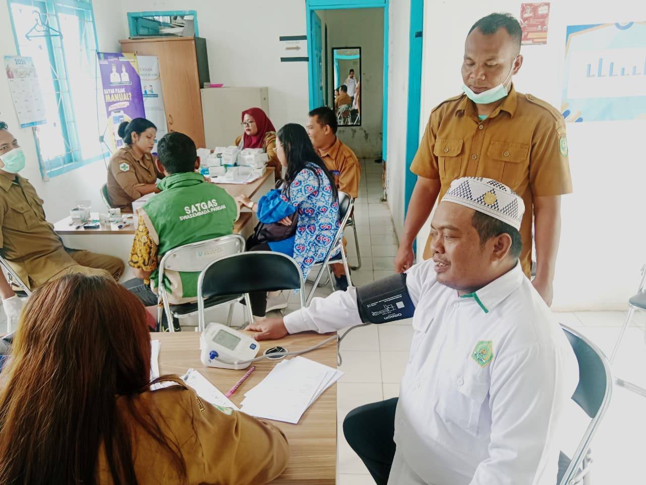 Raga Sehat, Khidmad Beribadat: Ikhtiar Kepala KUA Naga Juang Menjaga Amanah di Bulan Suci