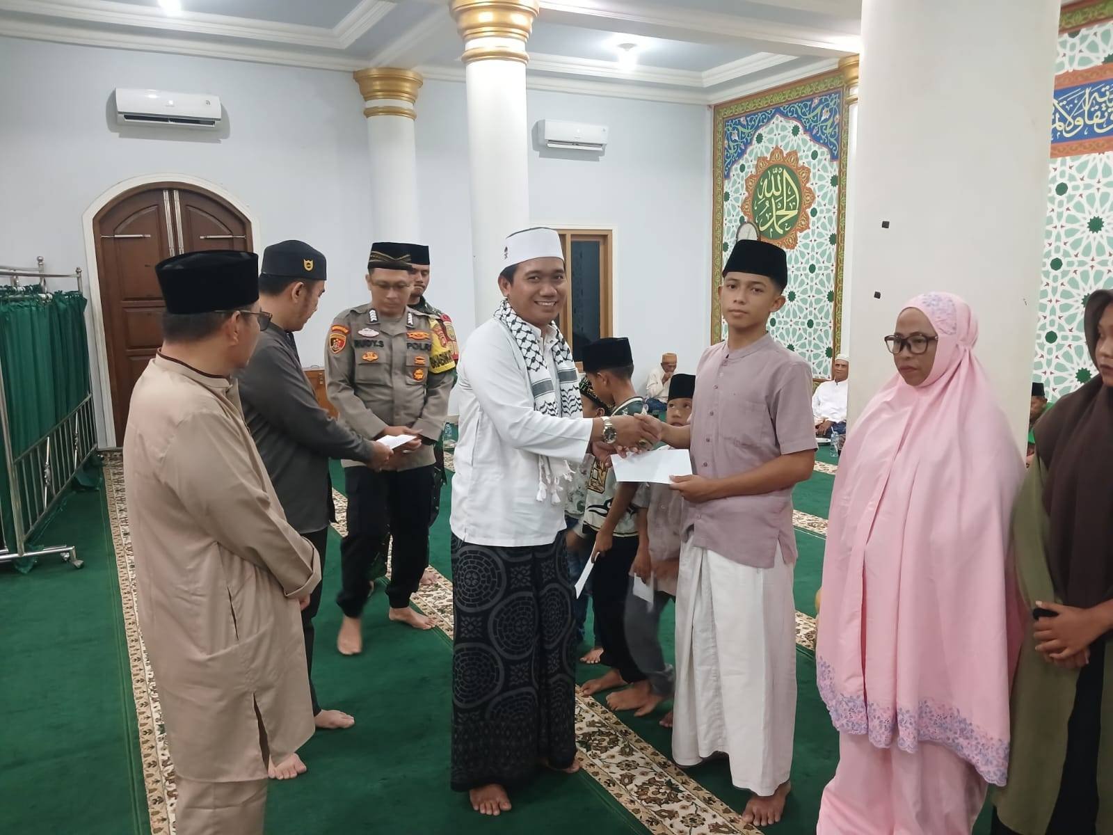 KUA Belitang menghadiri  Safari Ramadhan dan santunan Anak yatim 