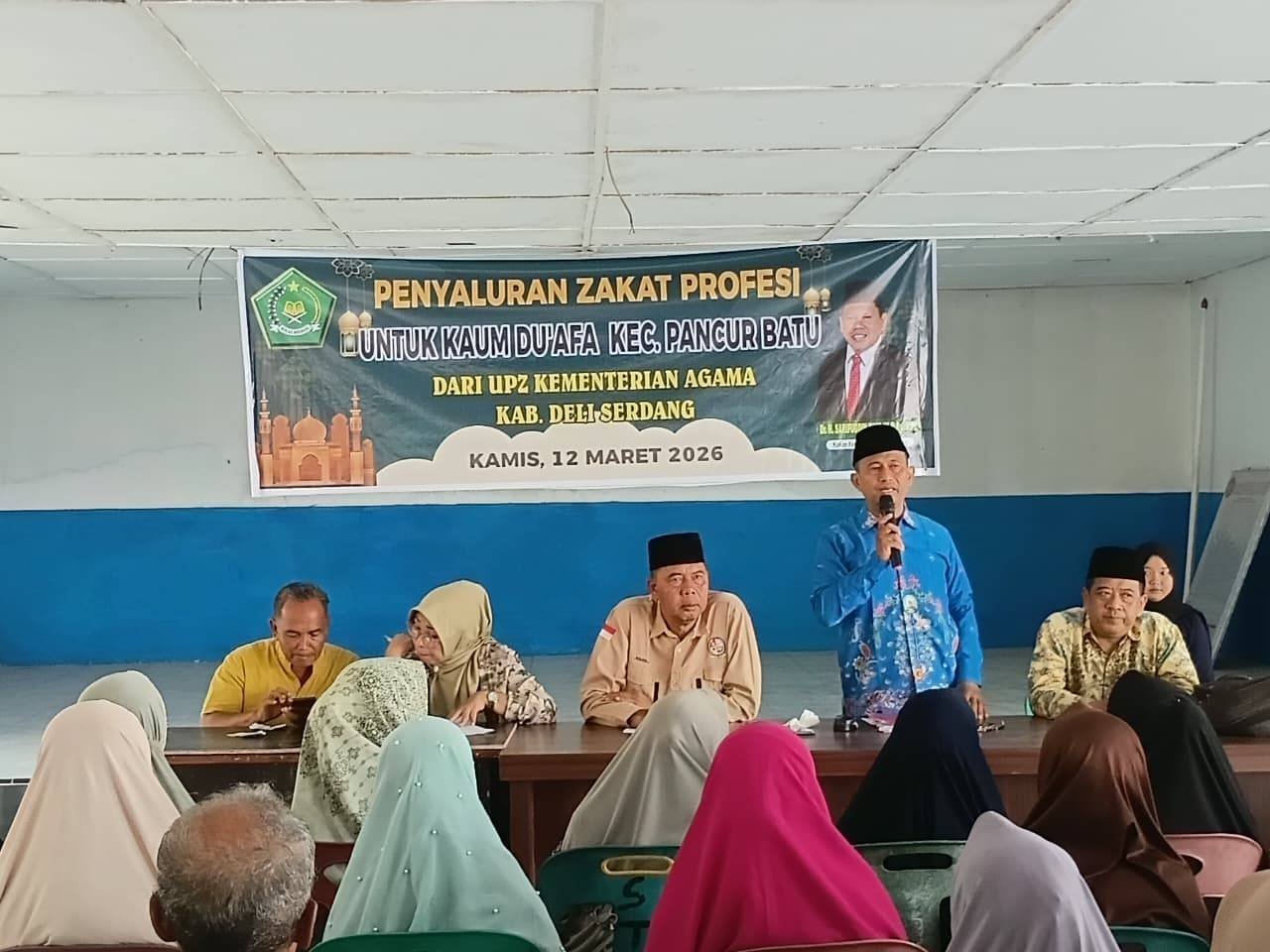 Wakili Kakan Kemenag, Ka. KUA Pancur Batu Salurkan Zakat Profesi ASN untuk Masyarakat