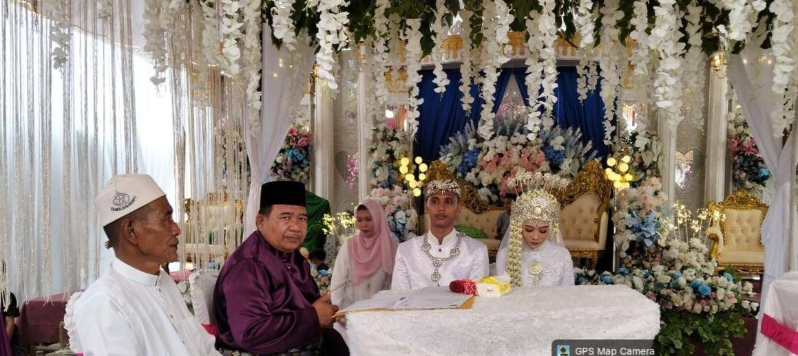 Dedikasi Tanpa Batas, Kepala KUA Rimba Melintang Pimpin Akad Nikah di Masa WFA