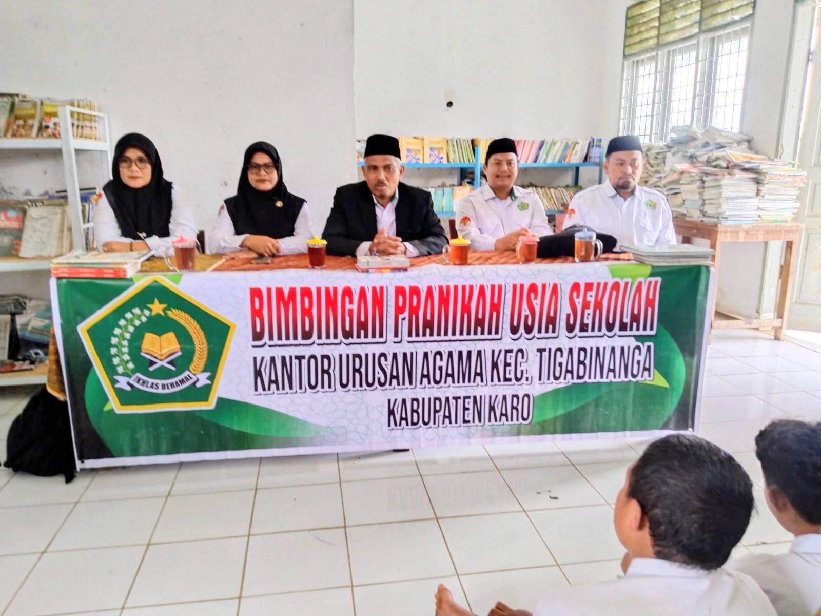 Pencegahan Perkawinan Usia Dini, KUA Tigabinanga Hadir Sebagai Fasilitator Kegiatan BRUS di SMPN 2 Tigabinanga