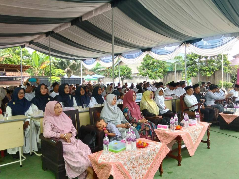 Kepala KUA Bandar Sribhawono Hadiri Harlah dan Wisuda Qur’ani