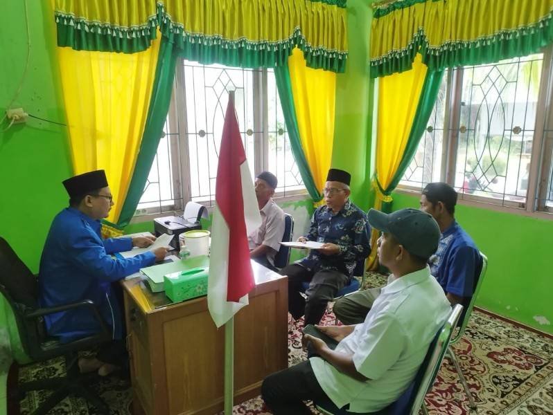 KUA Medang Kampai Optimalkan Pelayanan Wakaf Melalui Verifikasi Dokumen dan AIW