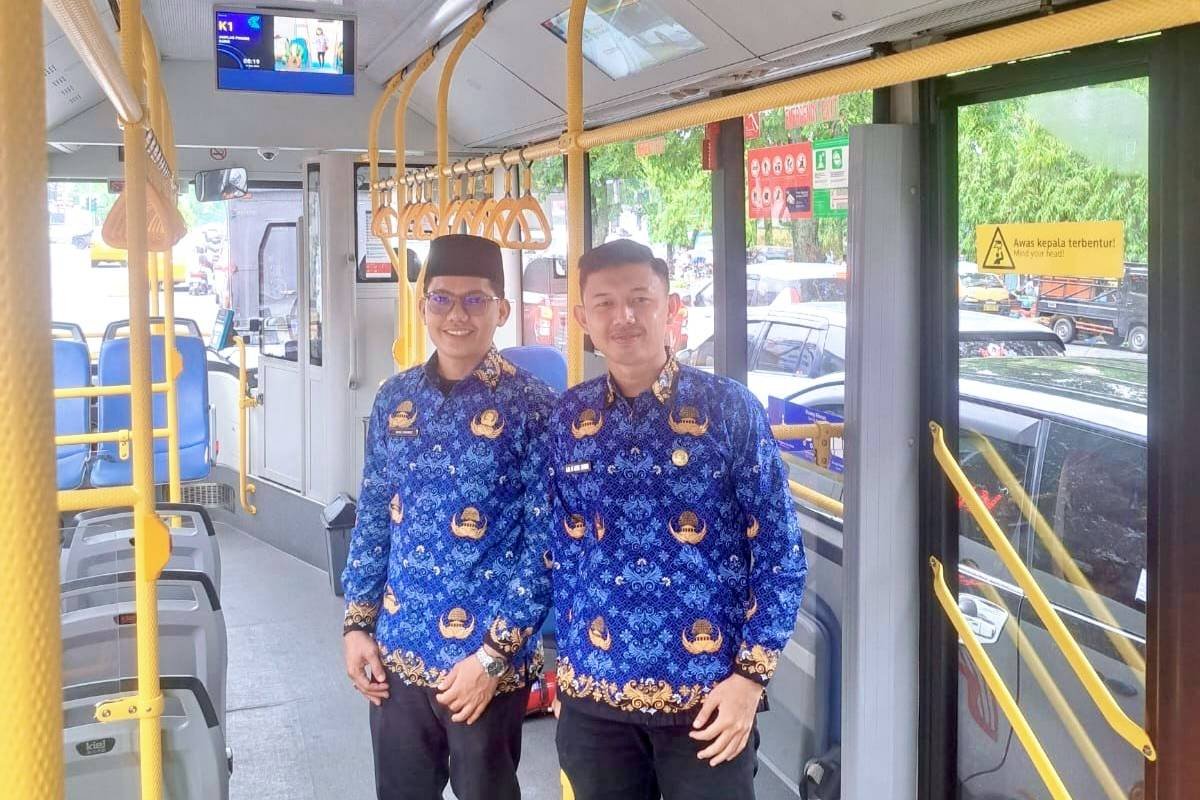 Menjemput Takdir PNS dari Jendela Bus Listrik: Kisah Dua CPNS Penghulu Kemenag Deli Serdang dan Spiritualitas Transportasi Publik