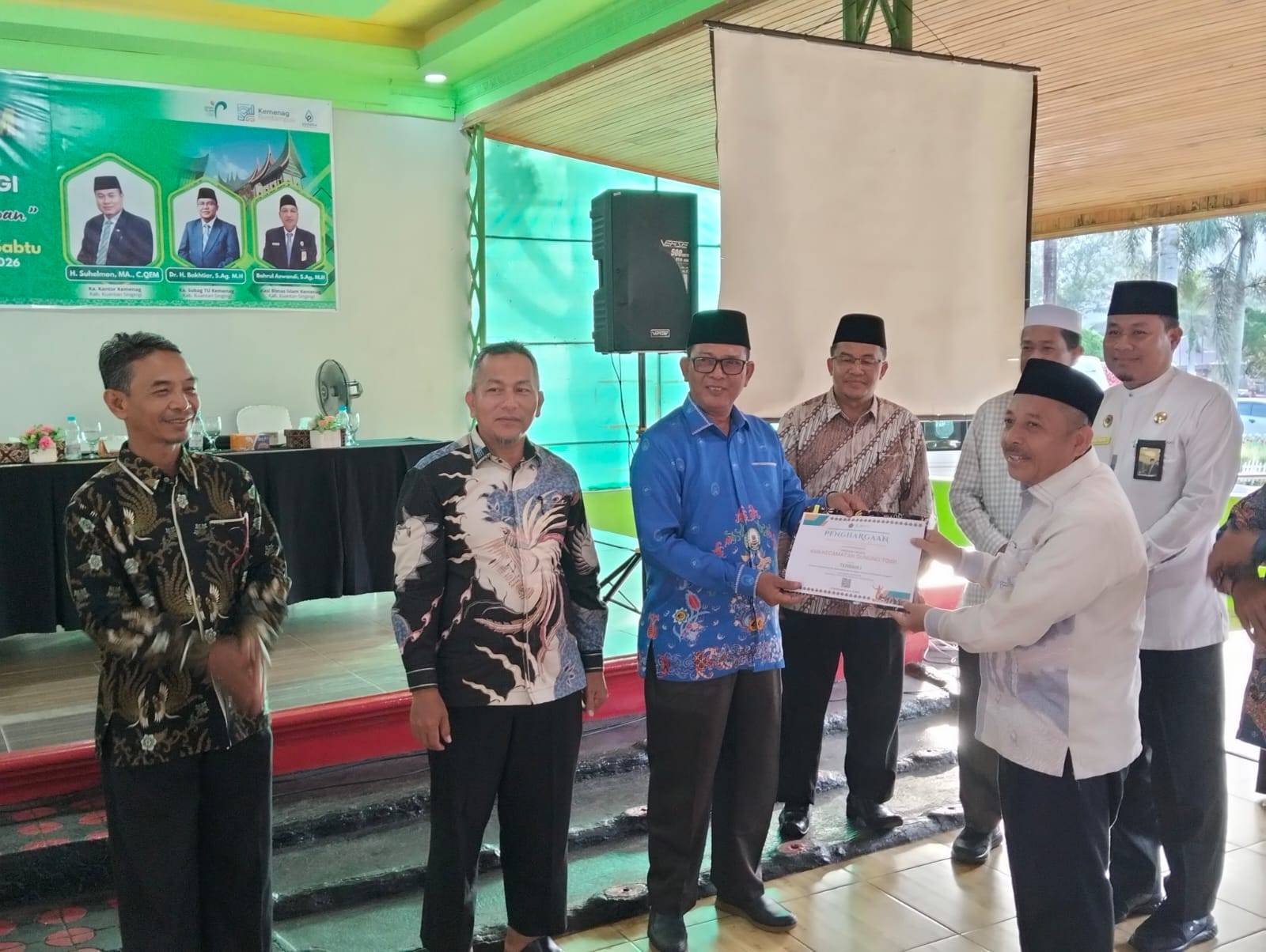 KUA Gunung Toar Mendulang Prestasi: Juara I Administrasi dan Juara III Penyuluh Teladan di Raker Bimas Islam Kuansing 2026