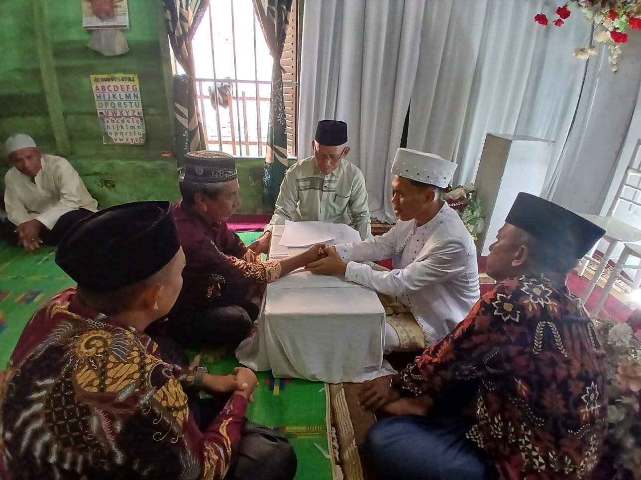 Kepala KUA Tanjungbalai Utara Tandai Hari Baru Indrian Sinaga dan Fitri Rangkuti