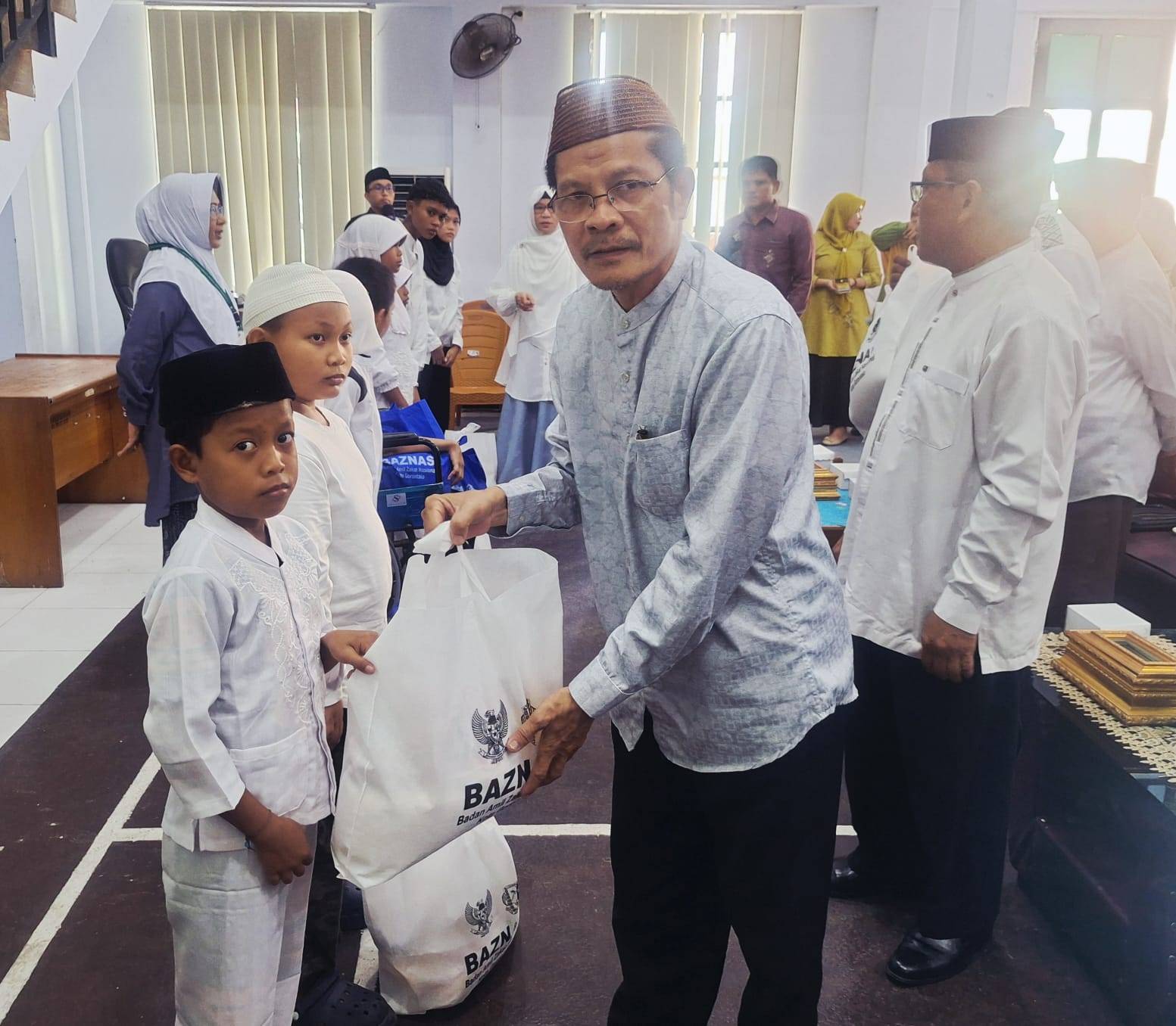 Tebarkan Kasih di Bulan Muharram, KUA Kota Tengah Hadiri 'Lebaran Yatim & Penyandang Disabilitas' Dengan Tema Menebar Maslahat, Menguatkan Umat