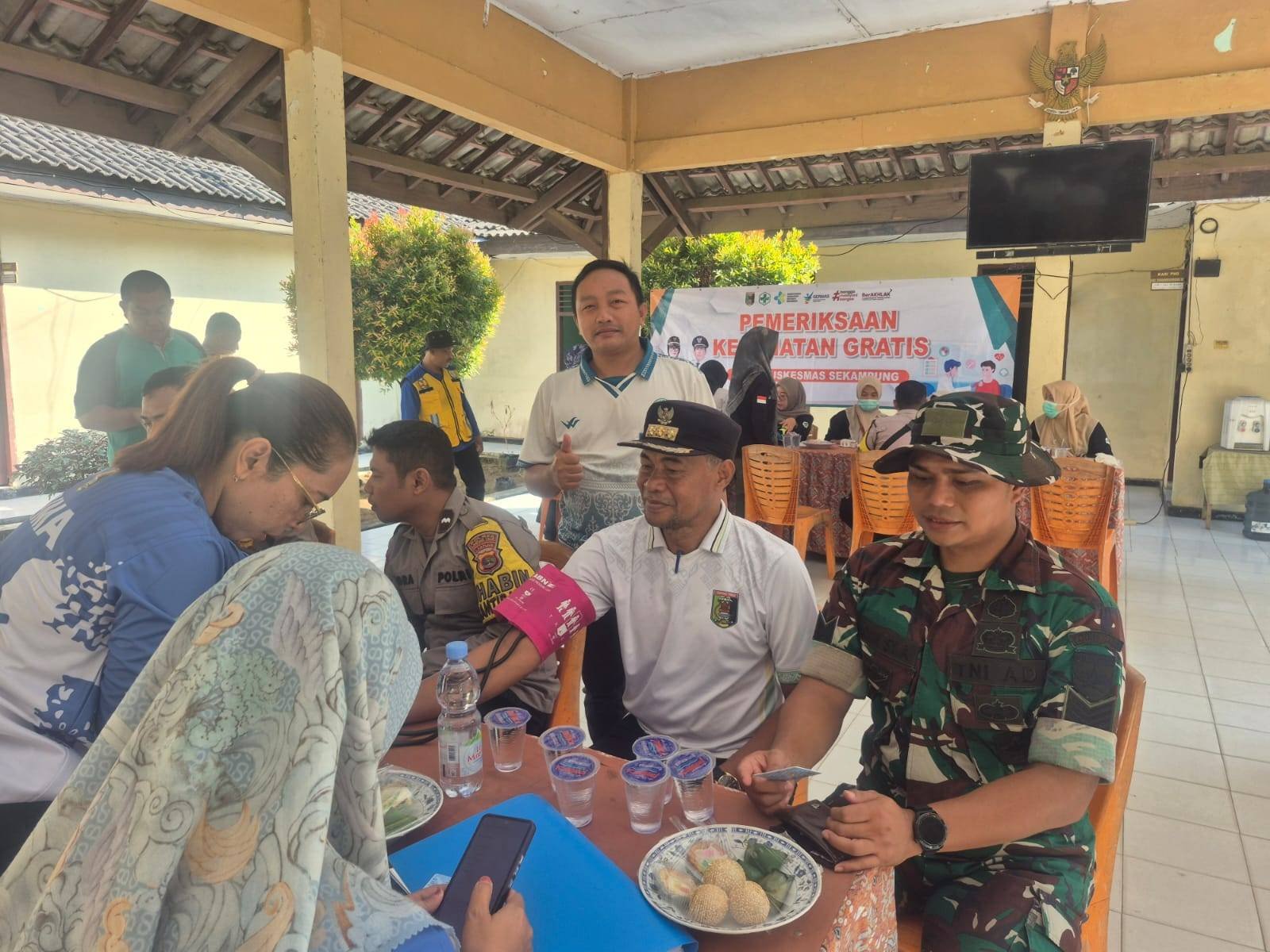 Penghulu dan Penyuluh KUA Sekampung Ambil Peran dalam Pelayanan Cek Kesehatan Gratis di Kecamatan Sekampung