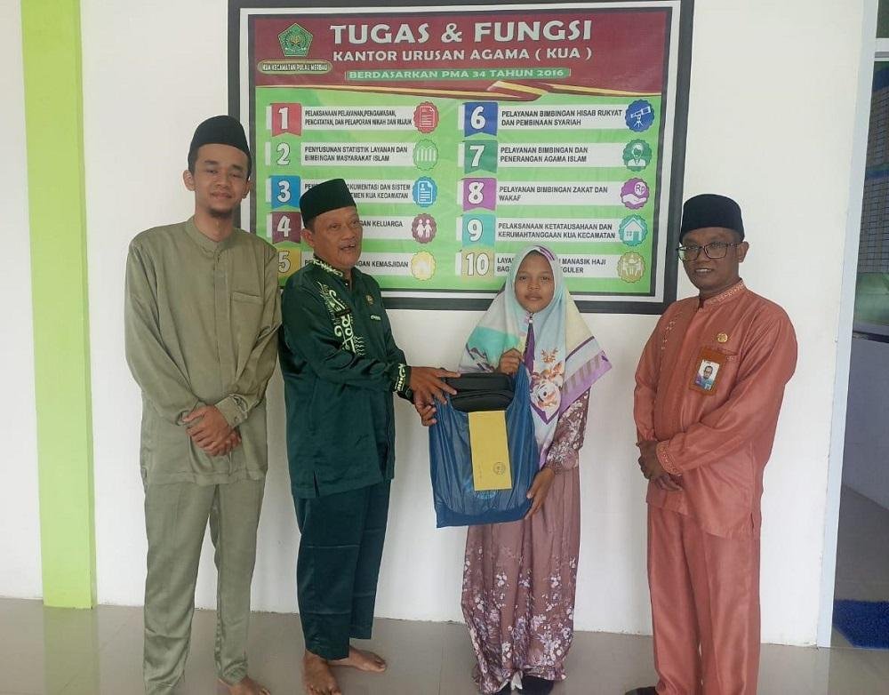 KUA Pulau Merbau Salurkan Santunan dalam Program Lebaran Yatim & Difabel 1447 H