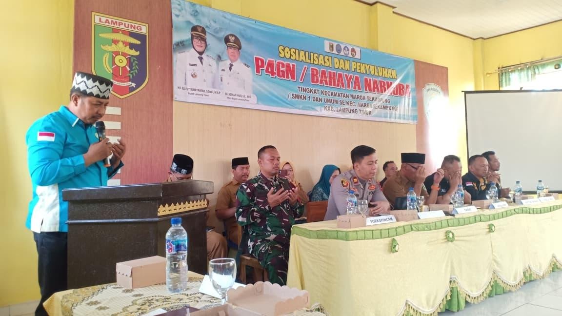 Kepala KUA Marga Sekampung Pimpin Doa Sosialisasi P4GN di SMKN I Marga Sekampung 