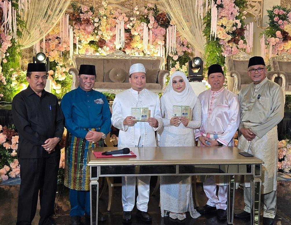 H. Suhaimi, S.Ag, MH Hadiri Akad Nikah Ichsan & Safitrah Di Hollywood Hotel