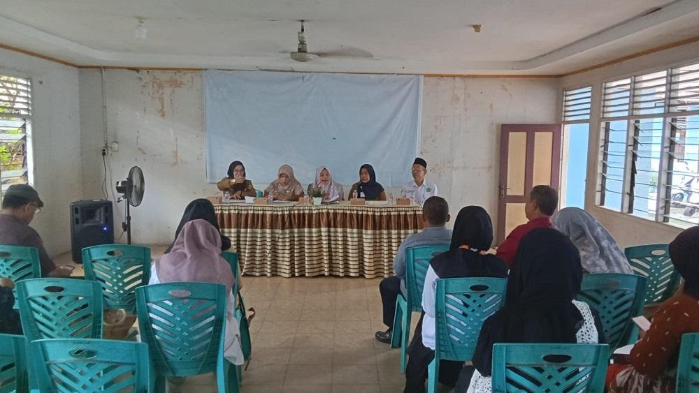 Penghulu Muda KUA Payung Sekaki Hadiri Undangan Kelurahan Tampan