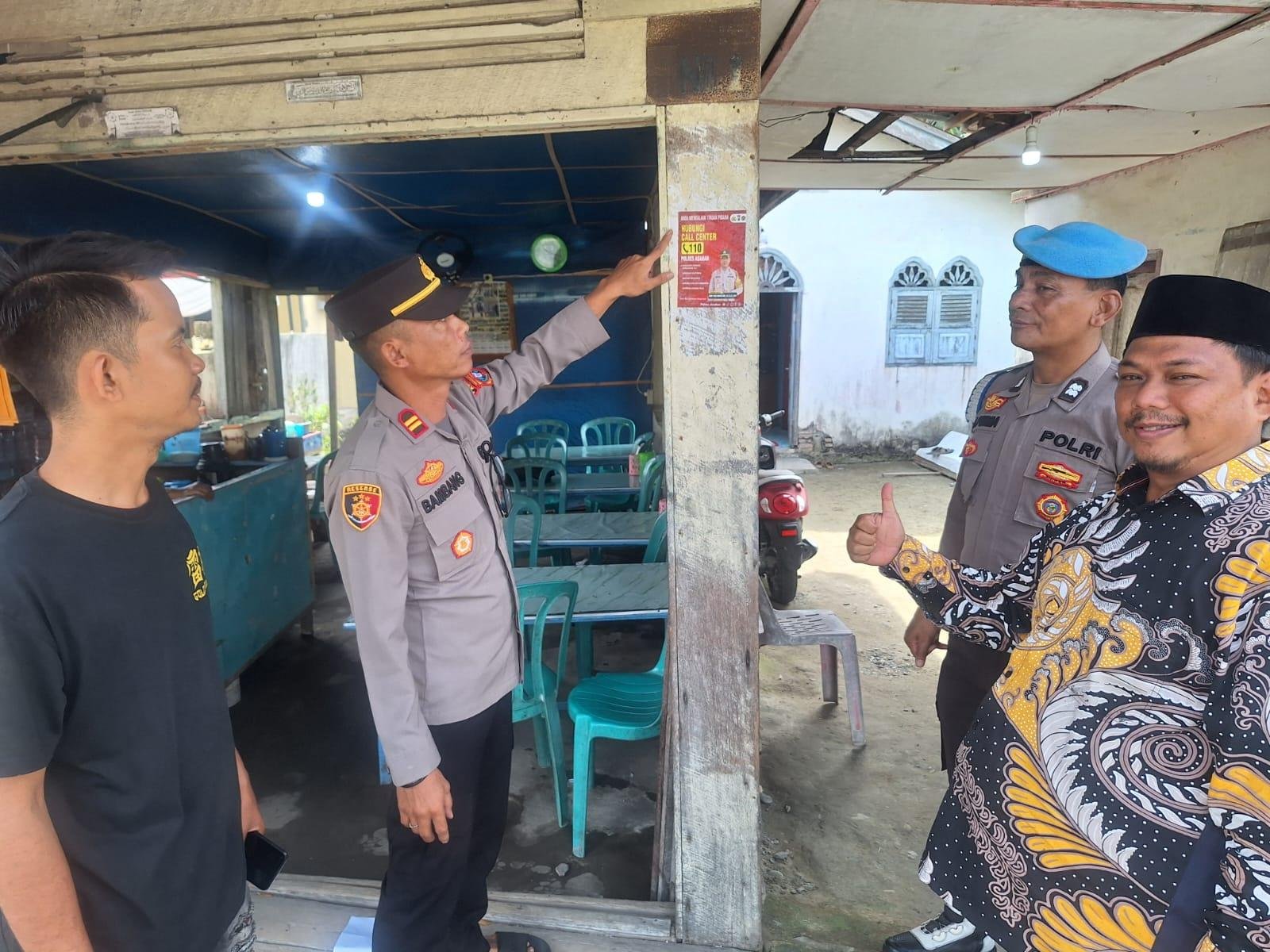 Kepala KUA Sei Kepayang Kolaborasi dengan Kapolsek Sosialisasikan Pengaduan Online Call Center 110