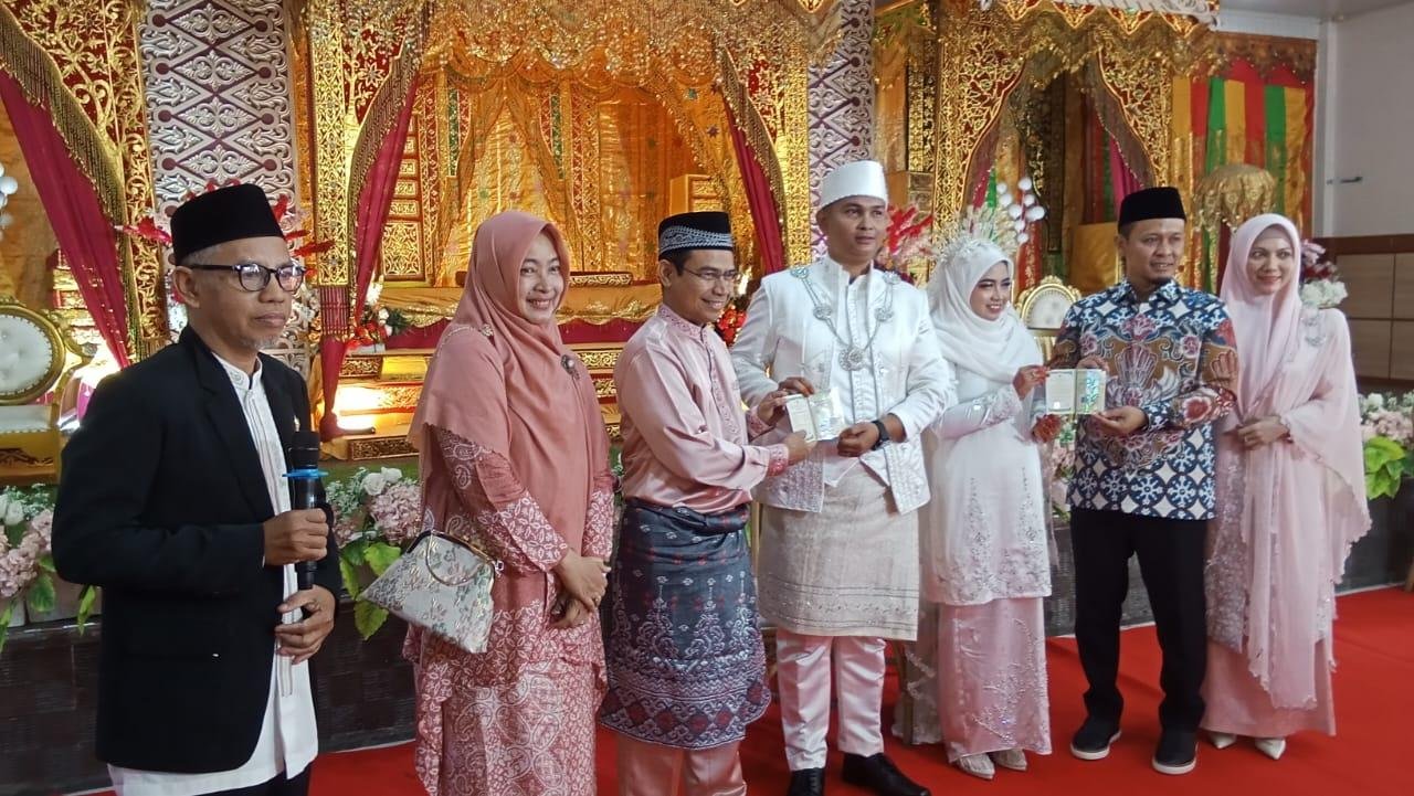 Penghulu Muda KUA Payung Sekaki Hadiri Akad Nikah Abil dan Waafiq