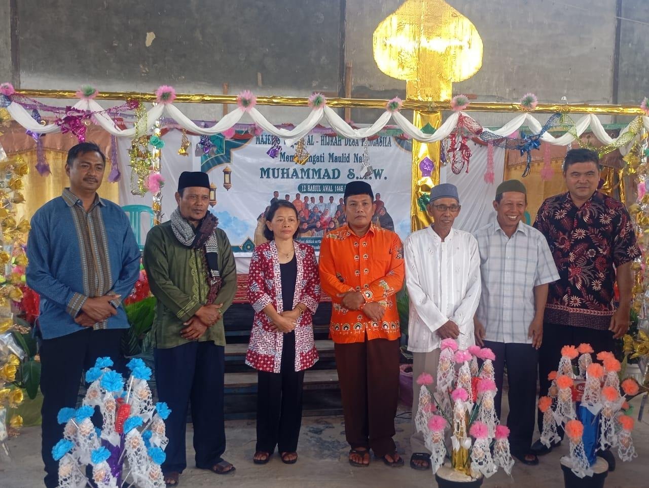 Ka. KUA Pamona Selatan Membawakan Hikma Maulid Nabi Muhammad SAW Di Desa Pancasila Kec. Pamona Timur